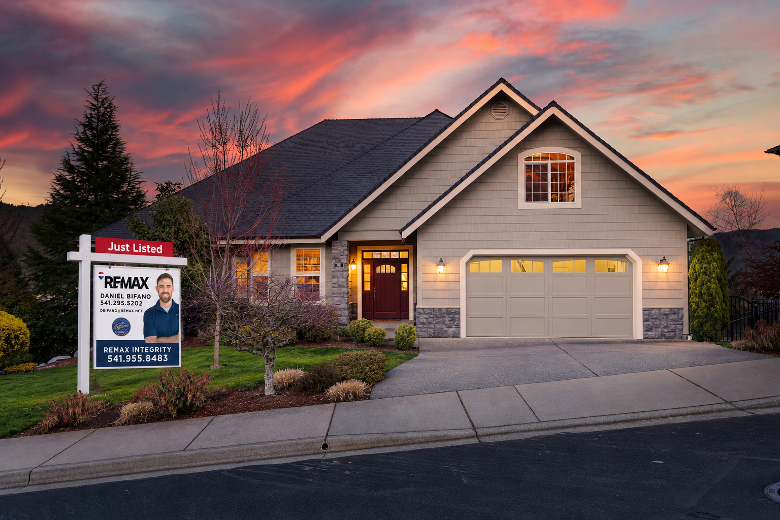 A Bifano Home Team “Just Listed” sign in front of a single-family home in Grants Pass, Oregon at sunset, with Rogue Valley hills in the background