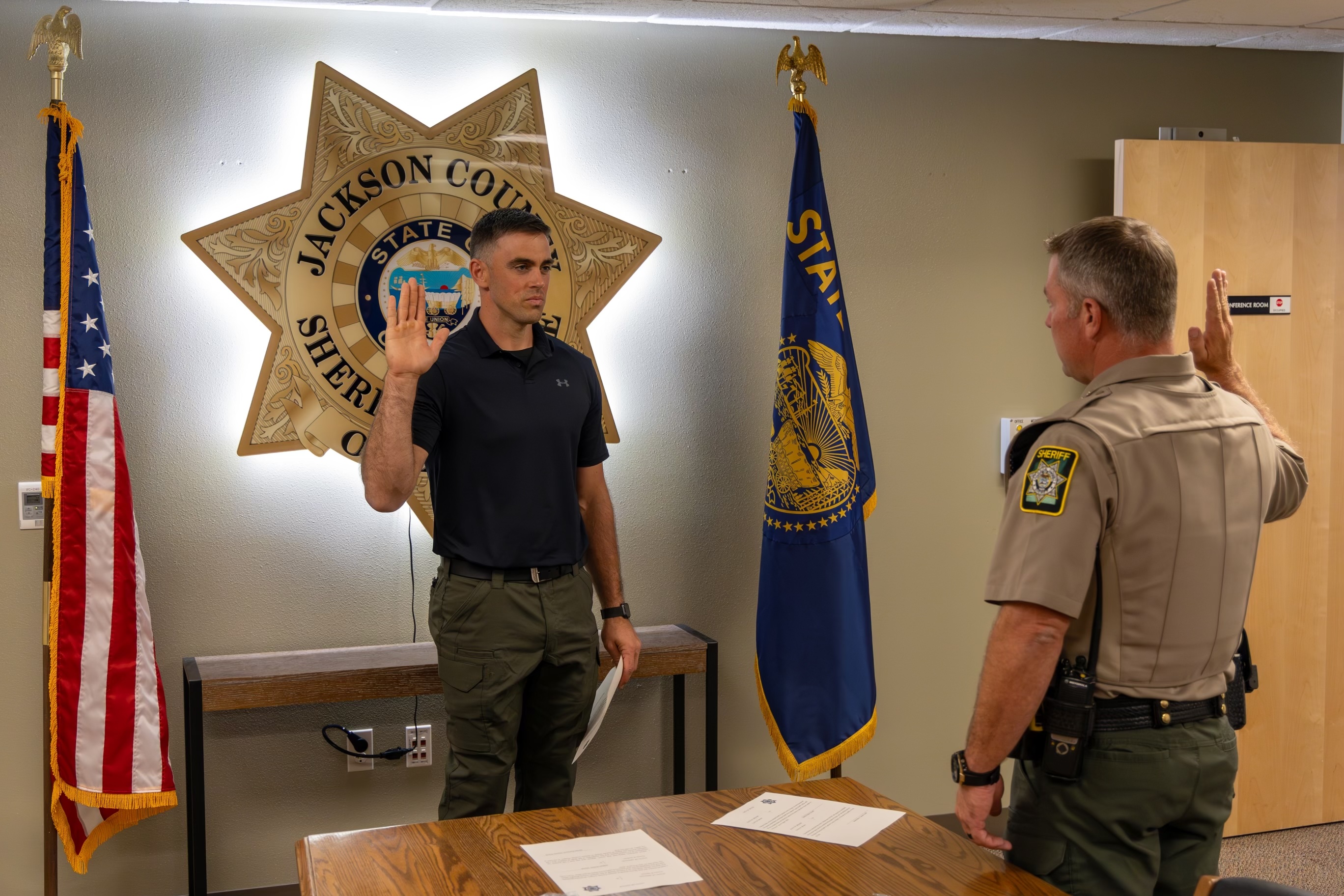 Daniel Bifano being sworn in as a Jackson County Sheriff's deputy