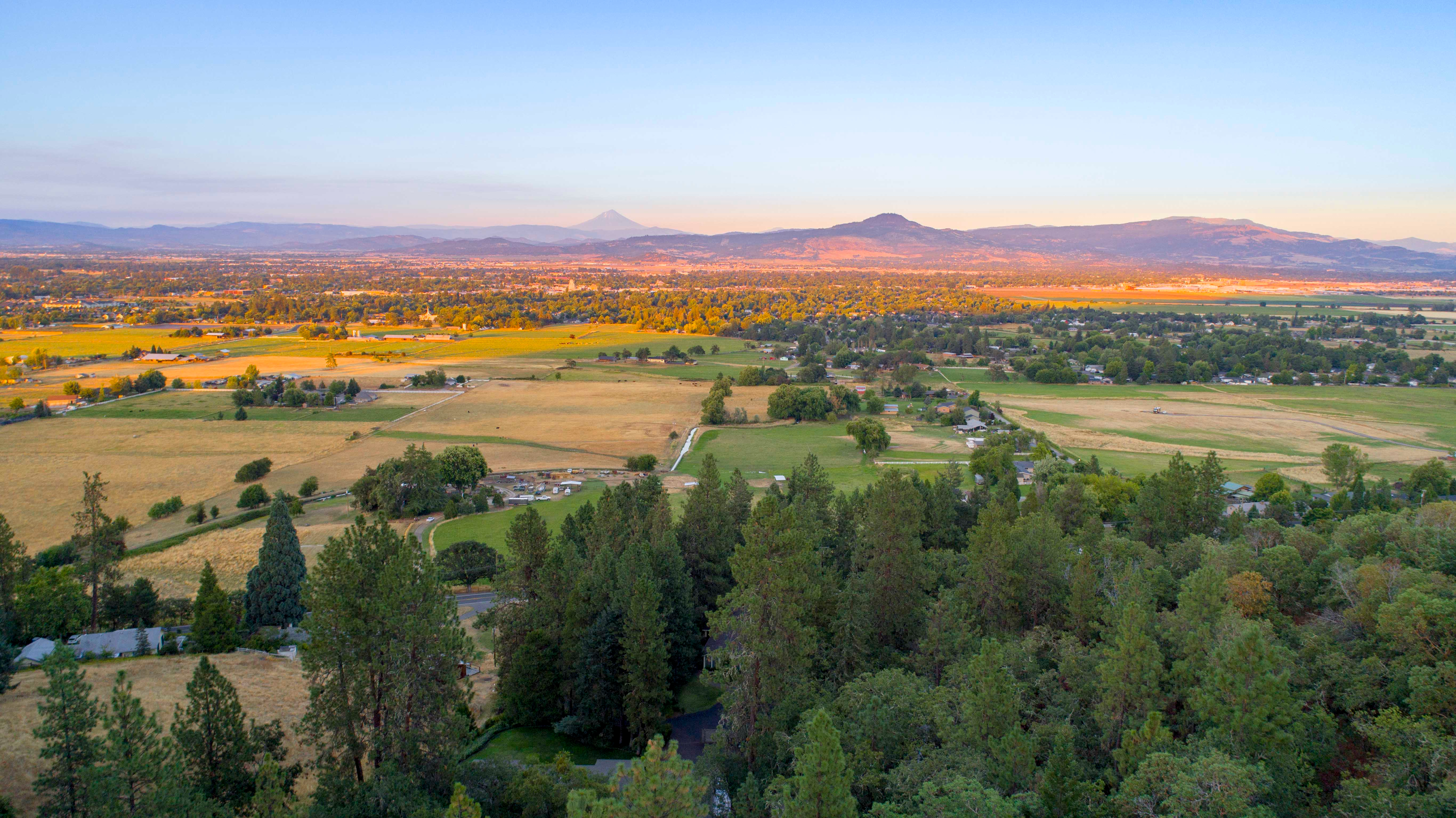 The Rogue Valley at sunrise looking across Medford and Central Point toward Mount McLoughlin